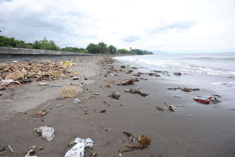 Trash covers a beach in Lovina, Bali.