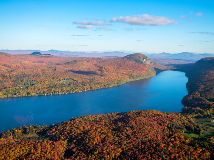 Aerial of Lake Willoughby Vermont during peak foliage in the fall.